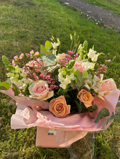 Peach Blossom - A soft and romantic bouquet inspired by blooming garden florals in warm, delicate tones. this arrangement is beautifully balanced with fresh eucalyptus and lush greenery. Light, airy, and full of natural charm, it’s perfect for celebrating special moments, sending love, or bringing a gentle touch of beauty to any space.